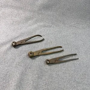 Three Antique Cast Iron Handheld Bullet Molds