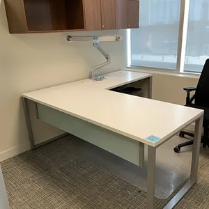 L-shaped desk, wooden with metal legs and glass accent, keyboard tray, and wooden wall-mounted hutch cupboard