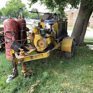 HOT TAR MACHINE