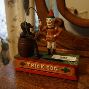 Vintage Cast Iron 'Trick Dog' Coin Bank