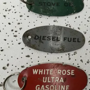 Three White Rose Storage Tank Tags