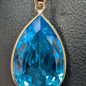 10K(1.49G), BLUE TOPAZ (6.6++CT) PENDANT, SUGGESTED RETAIL VALUE $1000