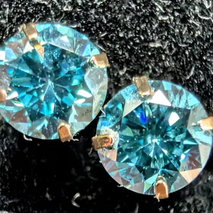 14KBLUE LAB DIAMOND (0.42CT)EARRING, SUGGESTED RETAIL VALUE $800
