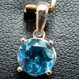 10K(0.69G), BLUE TOPAZ (1CT)PENDANT, SUGGESTED RETAIL VALUE $1000