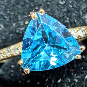 10K(1.8G), BLUE TOPAZ (1CT), DIAMOND (0.06CT)RING, SIZE 7, SUGGESTED RETAIL VALUE $2400