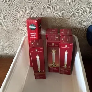 Bin with assorted candle lamps