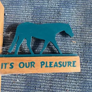 Wooden horse sign