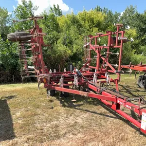 25’ WIL-RICH 2500 Field Cultivator w/ Bolt On Sweeps, (4) Bar Spring Tooth Harrow, Walking Tandems