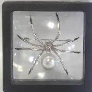 SPIDER BROOCH WITH SIM. PEARL BODY