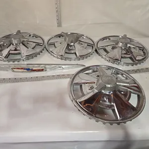 Set of 4 Vintage Hub Caps (12 1/2")  & Chevrolet Front Grill Bar Emblem