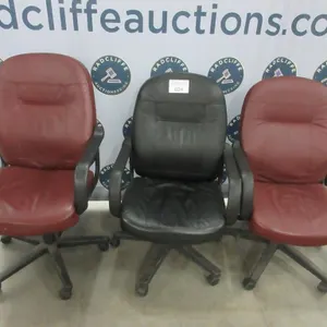 Three rolling office chairs: 2 burgundy, 1 black