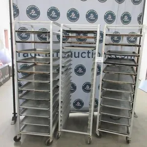 3 Speed Racks on swivel castors with sheet pans
