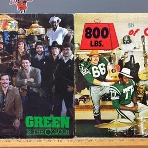 2 Sask. Roughrider Record Albums.