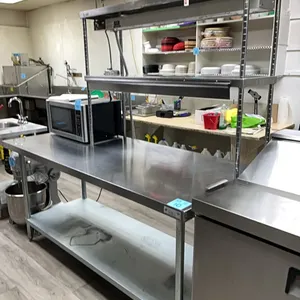 Prep Table and Food Warmer, stainless steel 2-shelf prep table 72”x30”x35” model T3072, with attached Hatco Glo-Ray foodwarmer 48”x14”x36” model SEDOS