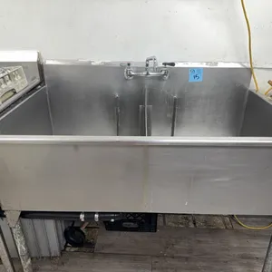 Stainless steel sink, ￼51” wide x 29” from wall 
24” x 27” sink compartments inside