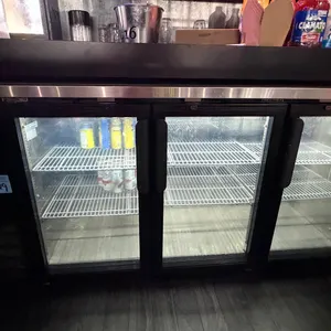 Kelvinator commercial three door bar refrigerator, stainless steel top, 73” long x 36.5” tall￼