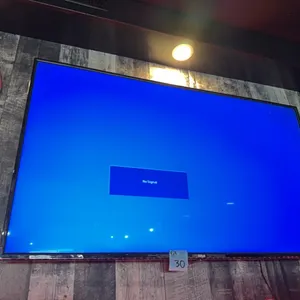 RCA 65” LED UHD TV model RTU6550 with wall mount