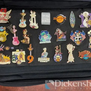FANTASTIC COLLECTION OF HARD ROCK CAFE PINS & CASE