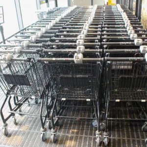 APPROXIMATELY 64 BLACK WIRE METAL SHOPPING CARTS