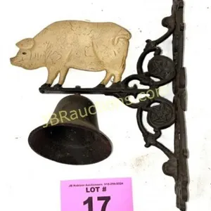 IRON BELL WITH PIG FROM BUSSEY'S BBQ RESTAURANT