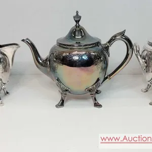 Tea set marked Wilcox Silver P Co. W. Meride. OB