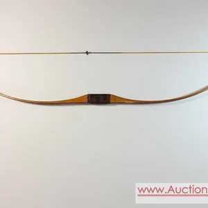 Vintage 52# BEAR "GRIZZLY" Recurve Bow. Marked 7712 and 52#. See photos for original decals and markings. Limbs felt stout when stringing bow.