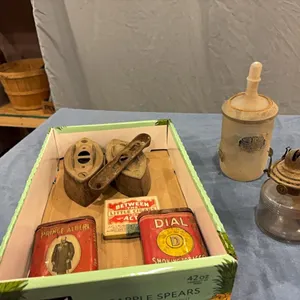 Sad irons, fire extinguisher, tins
