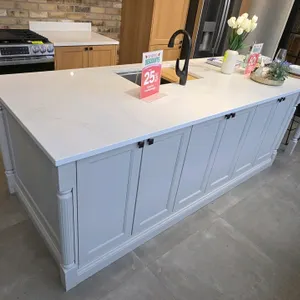 Wren Kitchens Infinity Plus kitchen island. Features a Rhino quartz countertop, stainless steel single-bowl undermount sink with a black gooseneck fau