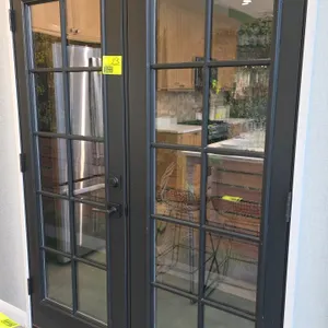 Set of 30" x 80" French doors. Features a 10-lite glass pane design on each door with a dark gray finish. Includes a Schlage deadbolt and matching lev
