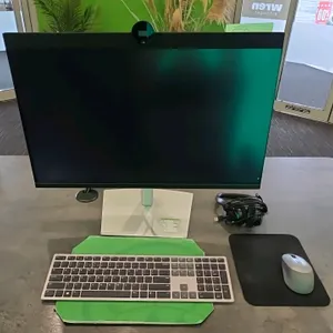 Dell P2724DEB 27" flat panel monitor with ASUS computer tower, keyboard, mouse, and headphones. Monitor Service Tag: BC82F34. Computer tower features 