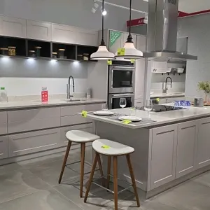 Infinity Plus Milano Shaker Chelsea Juratek Cashmere Matte cabinet display set. Features Rhino quartz countertops, 2 sinks, and faucets. Includes oven