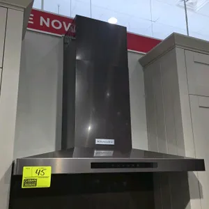 KitchenAid KVWB606HBS2 wall-mount canopy range hood. Features stainless steel finish, electronic controls, integrated lighting, and multi-layer mesh g
