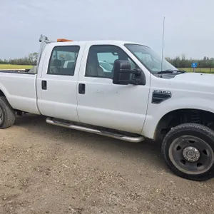 *MUNICIPAL* 2008 FORD SUPERDUTY F.50, CREW CAB, 5.4L, V8, 4WD, CLOTH, TILT, CRUISE, AM/FM  94,707KM'S SHOWING  S/N: 1FTWW31518EB64425