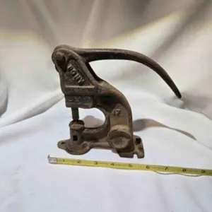 Vintage cast iron riveting machine