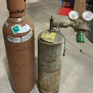 2 Tanks Unknown Contents.