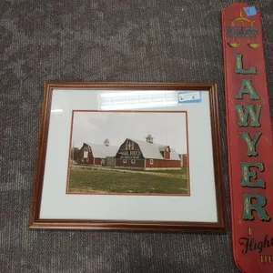 Framed photo and wood sign