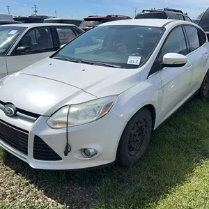 2012 FORD FOCUS 4DR CAR - ITEMS IN OFFICE