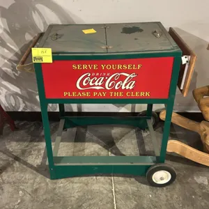 A Limited Edition Reproduction of a 1929 Glascock Coca-Cola Bottle Cooler. (Glascock, 1990s) A reproduction of the iconic 1929 bottle cooler. Features