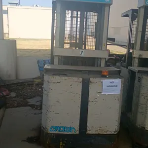 Crown 155P48TT-S electric stock picker. Features an aluminum platform attachment (Model A-61790). S/N: 1A214939. Note: Offered for parts only; unit is
