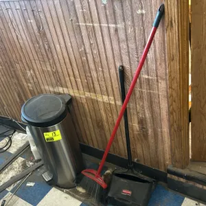 Cleaning and waste receptacle set. Includes (1) O-Cedar angled broom with red handle, (1) Rubbermaid Commercial Products lobby dustpan, and (1) stainl