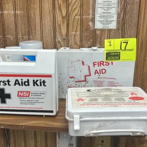 Assorted first aid and clean-up kits. Includes (1) Northern Safety & Industrial plastic first aid kit, (1) Standard #25 metal first aid kit, and (1) I