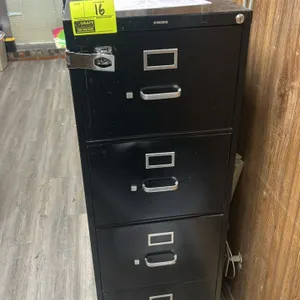 HON 4-drawer vertical filing cabinet. Features black metal construction with integrated pull handles and label holders. Note: Features an aftermarket 