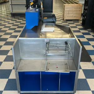 AFCO stainless steel checkout lane. Features stainless steel construction, blue interior accents, integrated bagging area with wire bag holder, and lo