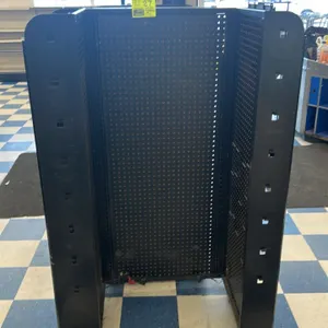 Portable candy and magazine display rack. Features black metal construction with pegboard panels, display hooks, slanted wire shelving, and flat side 