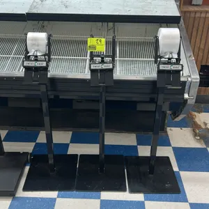 Twist-Ease metal produce bag stand. Features an integrated Twist-Ease bag dispenser designed for roll-mounted plastic bags. Mounted on a flat square m