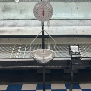 Detecto MCS hanging dial scale. Features a 40 lb. x 2 oz. capacity mechanical dial face and hanging stainless steel bowl with wire bail. Mounted on a 