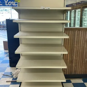 3'L Lozier single-sided wall shelving. Features (6) adjustable upper shelves and (1) 22"D base deck. Cream finish with black base shoes. Dimensions: 3