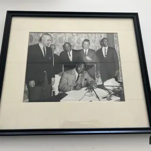 Photos of George, Jesse Owens and Ernie Banks 
 UNRESERVED