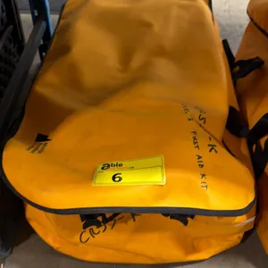 MEC COMMERCIAL BACKCOUNTRY LEVEL 3 EMERGENCY FIRST AID KIT IN ORANGE DUFFEL STYLE DRY BAG