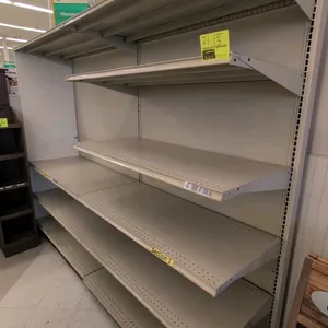 8'L of Madix wall shelving. Features an off-white finish, 22"D base shelves, and solid back panels. Includes adjustable upper shelves. 78"H. Contents 
